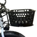 Black bicycle basket attached to a bike frame on a white background